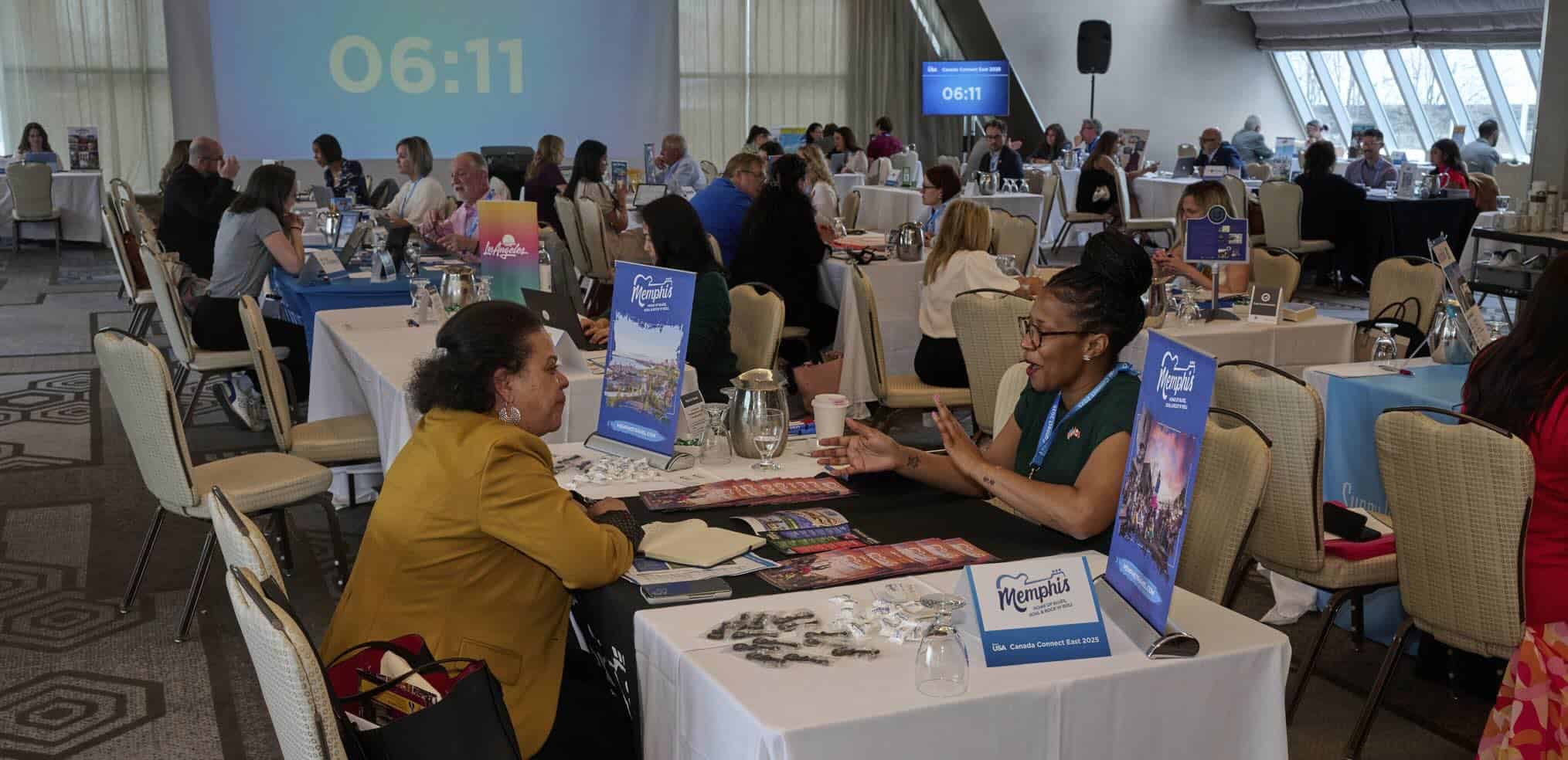 Attendees networking at the Brand USA Travel Week event in Canada.